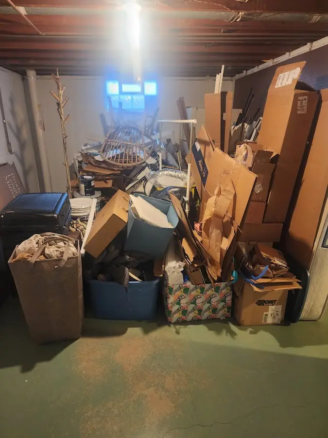 Roll-off dumpster container at job site for 8 Yard Dumpster Rental in Eastover